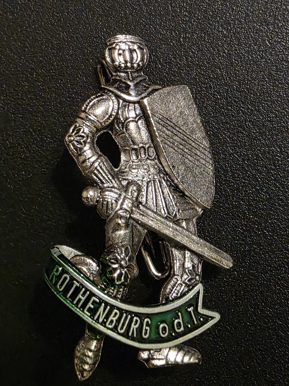 Vintage Silver Knight Brooch with Green Banner